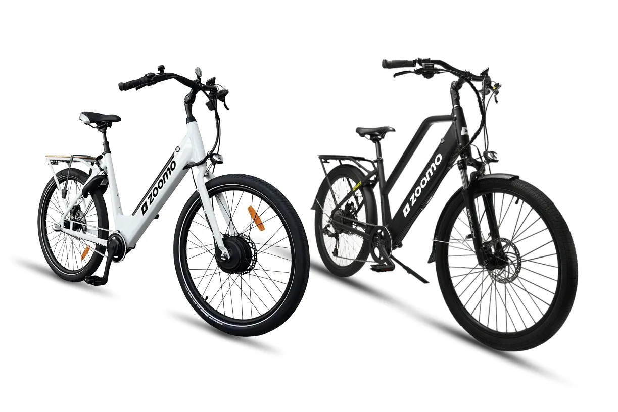Two Zoomo electric bikes side by side, one white and one black, displayed on a white background.