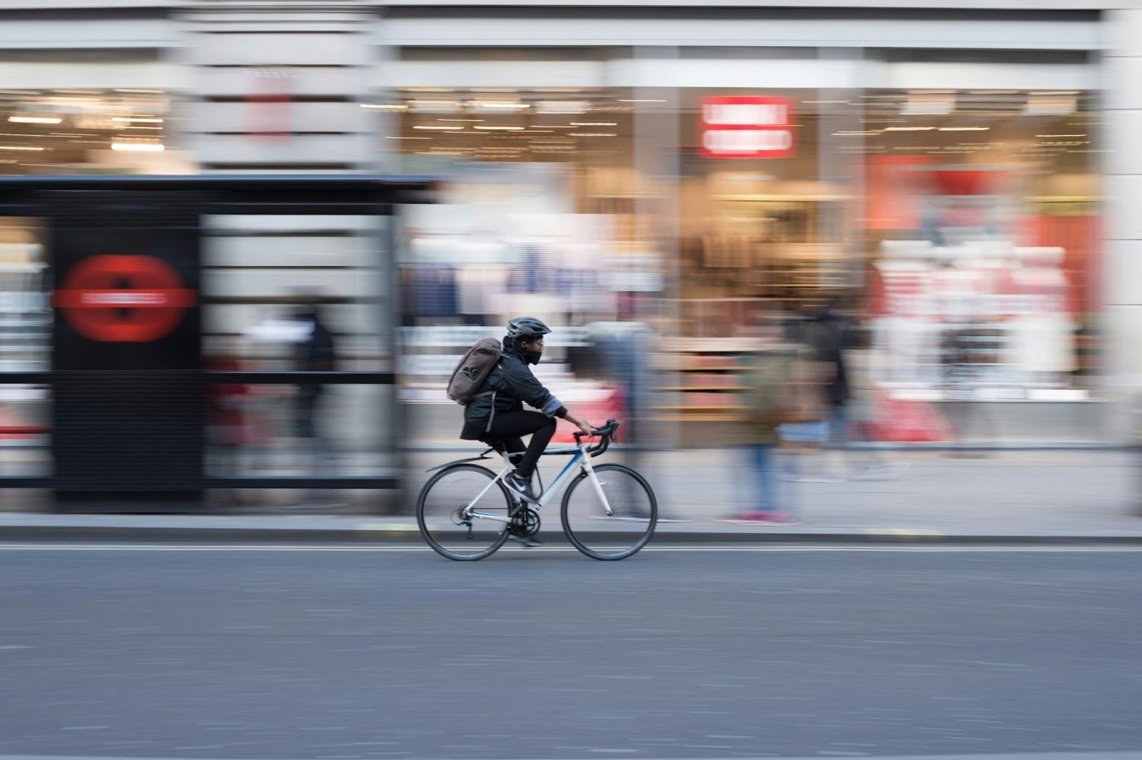 delivery rider with bicycle in the uk