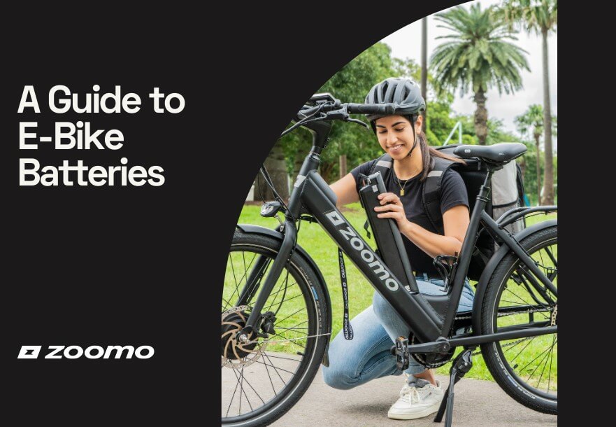 Rider changing a Zoomo’s battery